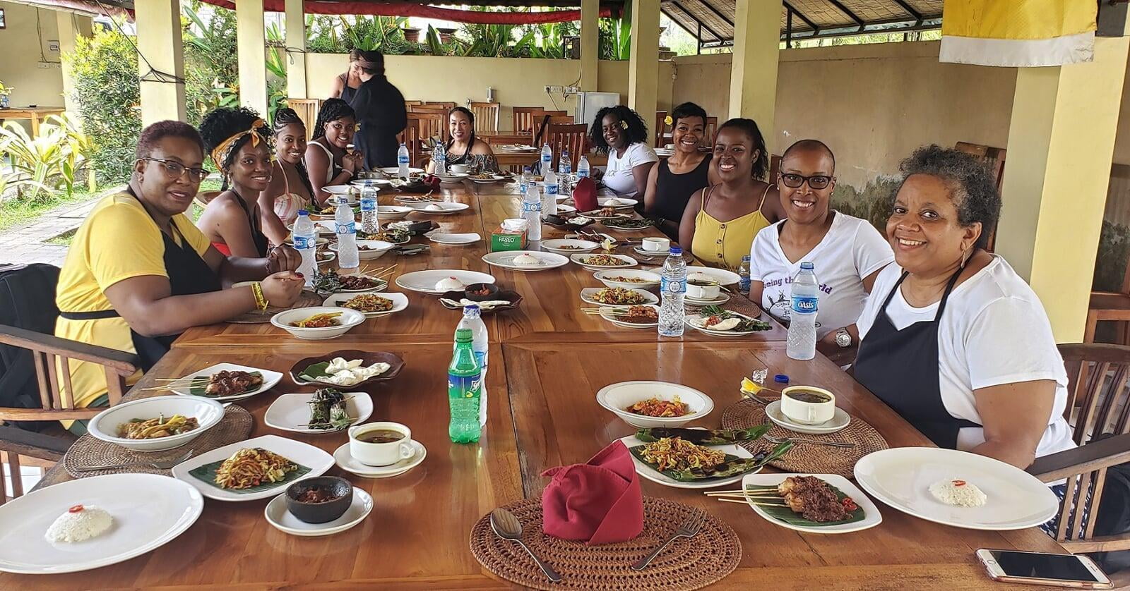 group of women sitting at a dinner table
